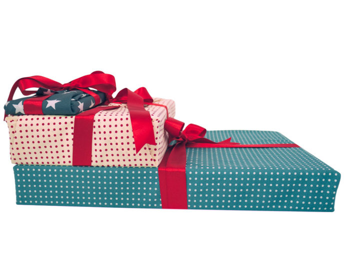 Fabric Gift Wrap Sizing: Monopoly in a Large, iPad Mini in a Medium and a Moleskine notebook wrapped in a Small