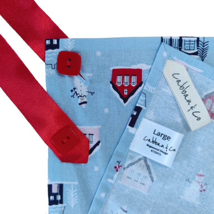 Light Blue Little Town fabric wrapping with red ribbon with red buttons